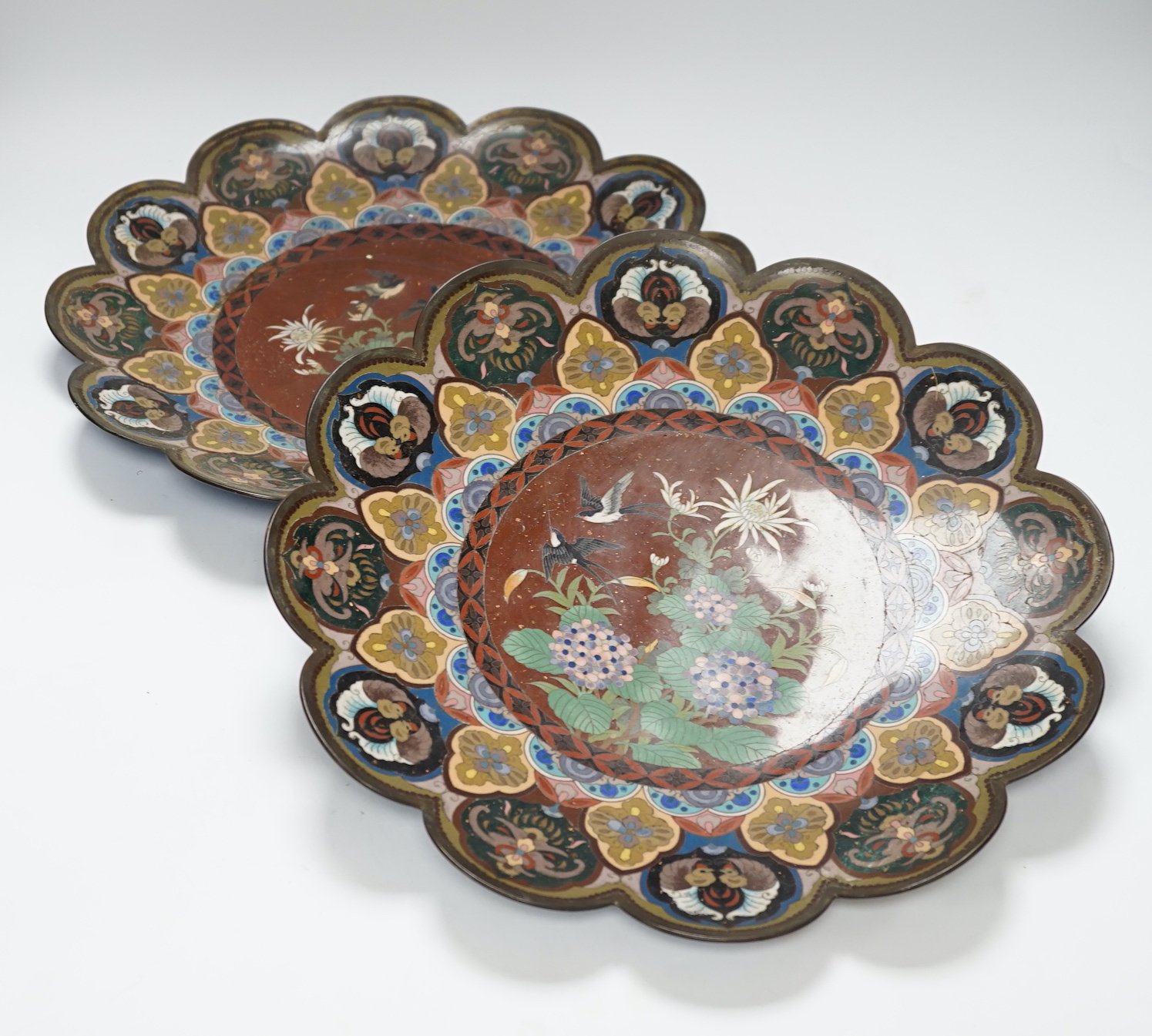 A pair of Japanese Meiji period petal rimmed cloisonné dishes, 37cm